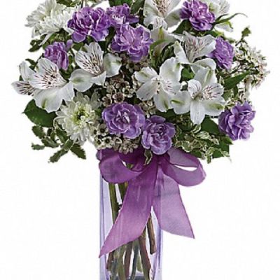 <div class="m-pdp-tabs-description">
<div id="mark-1" class="m-pdp-tabs-marketing-description">Fill their heart with laughter! The ultimate lavender-lover's bouquet, this gleeful gift of white and lavender blooms is delivered in a pretty pale lavender vase she'll cherish forever. Lavender organza ribbon adds that gifting touch.</div>
</div>
<p id="arrngDescp">Includes white alstroemeria, miniature lavender carnations, white chrysanthemums and waxflower, accented with fresh pittosporum and lemon leaf.</p>