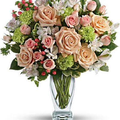 <div class="m-pdp-tabs-description">
<div id="mark-1" class="m-pdp-tabs-marketing-description">You'd do anything for them, so let them know how you feel by sending this generous and gorgeous arrangement. Who could ask for anything more?</div>
</div>
<p id="arrngDescp">Beautiful peach roses and spray roses, white alstroemeria, brilliant green carnations, peach hypericum and fresh garden greens are perfectly hand-arranged in a feminine Couture Vase.</p>