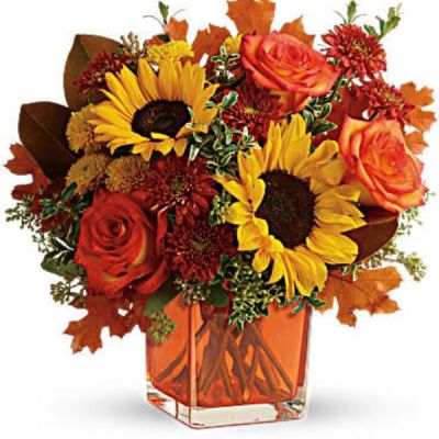 <div id="mark-3" class="m-pdp-tabs-marketing-description">Greet the new season with this heartwarming sunflower and rose bouquet, presented in a cheerful orange cube vase.</div>
<div id="desc-3">
<ul>
 	<li>This bright bouquet includes orange roses, yellow sunflowers, gold cushion spray chrysanthemums, rust cushion spray chrysanthemums, seeded eucalyptus, oregonia, and magnolia leaves.</li>
</ul>
</div>