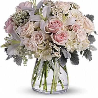 <div class="m-pdp-tabs-description">
<div id="mark-1" class="m-pdp-tabs-marketing-description">A whisper-quiet affirmation of love. Subtle shadings of pink and white roses, lilies and delicate Queen Anne's lace in a simple, elegant vase.</div>
</div>
<p id="arrngDescp">Gorgeous flowers such as white, crème and light pink roses, white oriental lilies and delicate Queen Anne's lace with a touch of silvery dusty miller, all in a classic vase.</p>